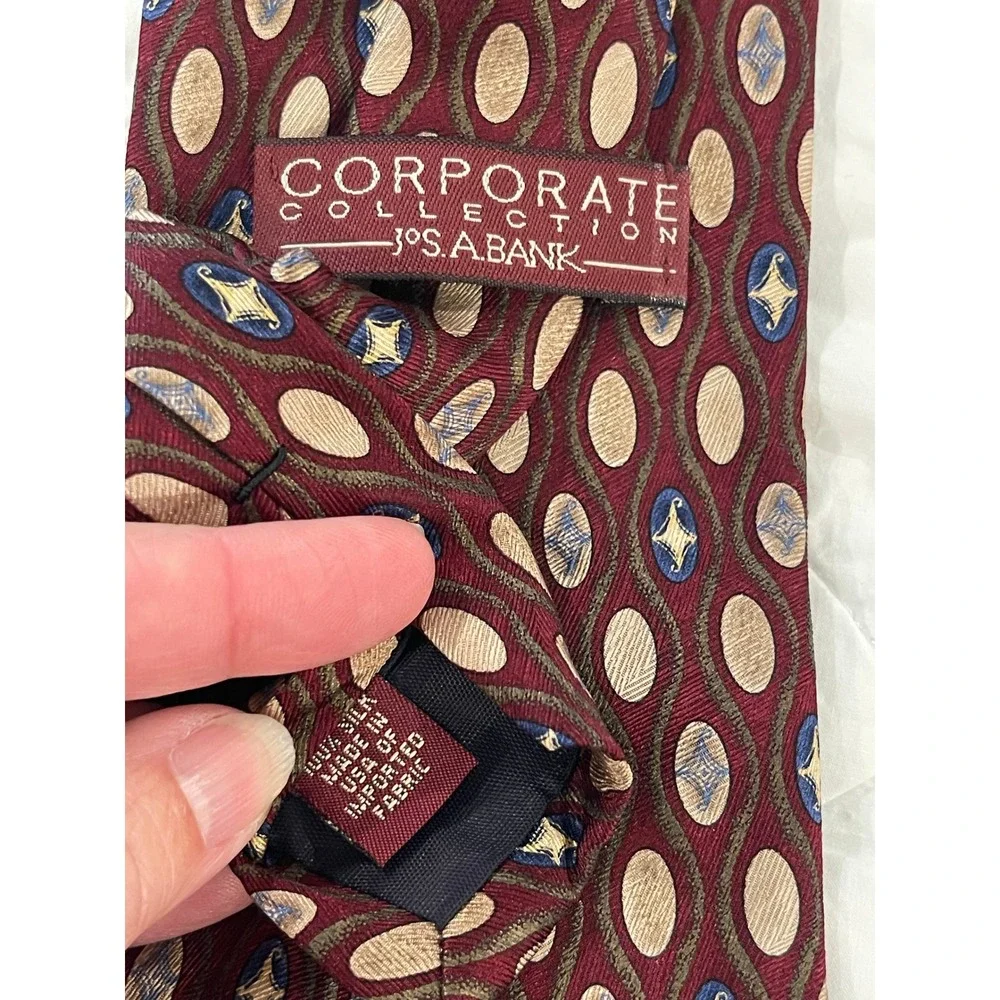 00244-JosA Bank Corporate Collection Silk Tie Burgundy Tan Blue Geometric w/ Box